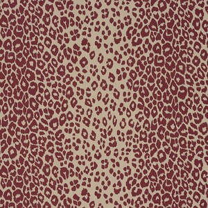May include: A beige fabric with a red leopard print pattern. The print is a repeating pattern of red spots on a beige background.