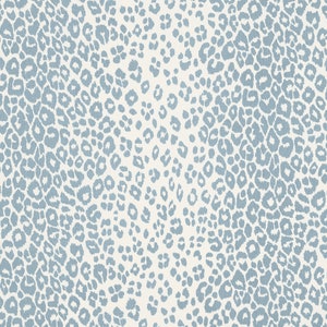 May include: A seamless pattern featuring a light blue leopard print on a white background.