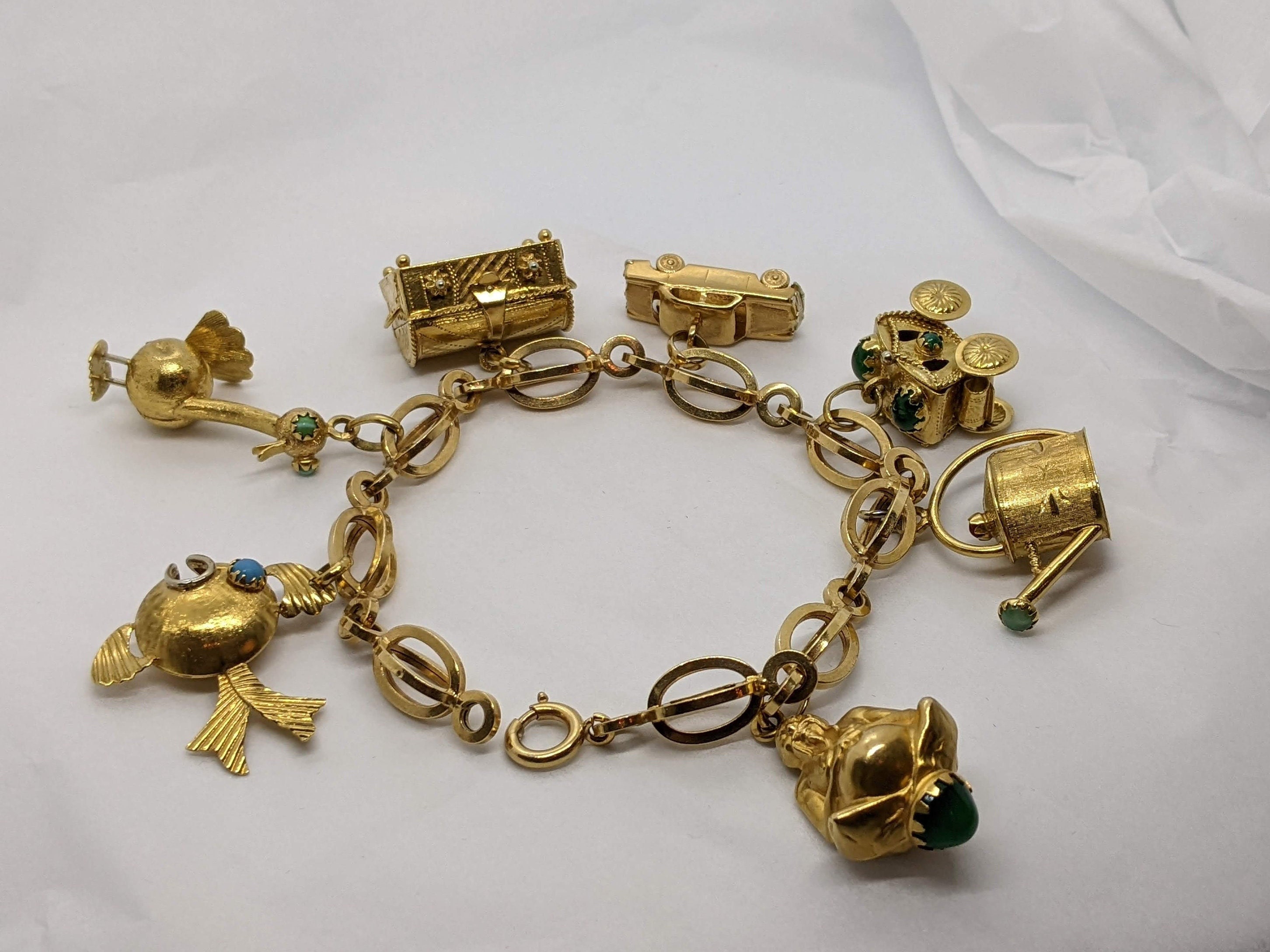 Ornate Gold Plated Charm Bracelet with 15 Charms