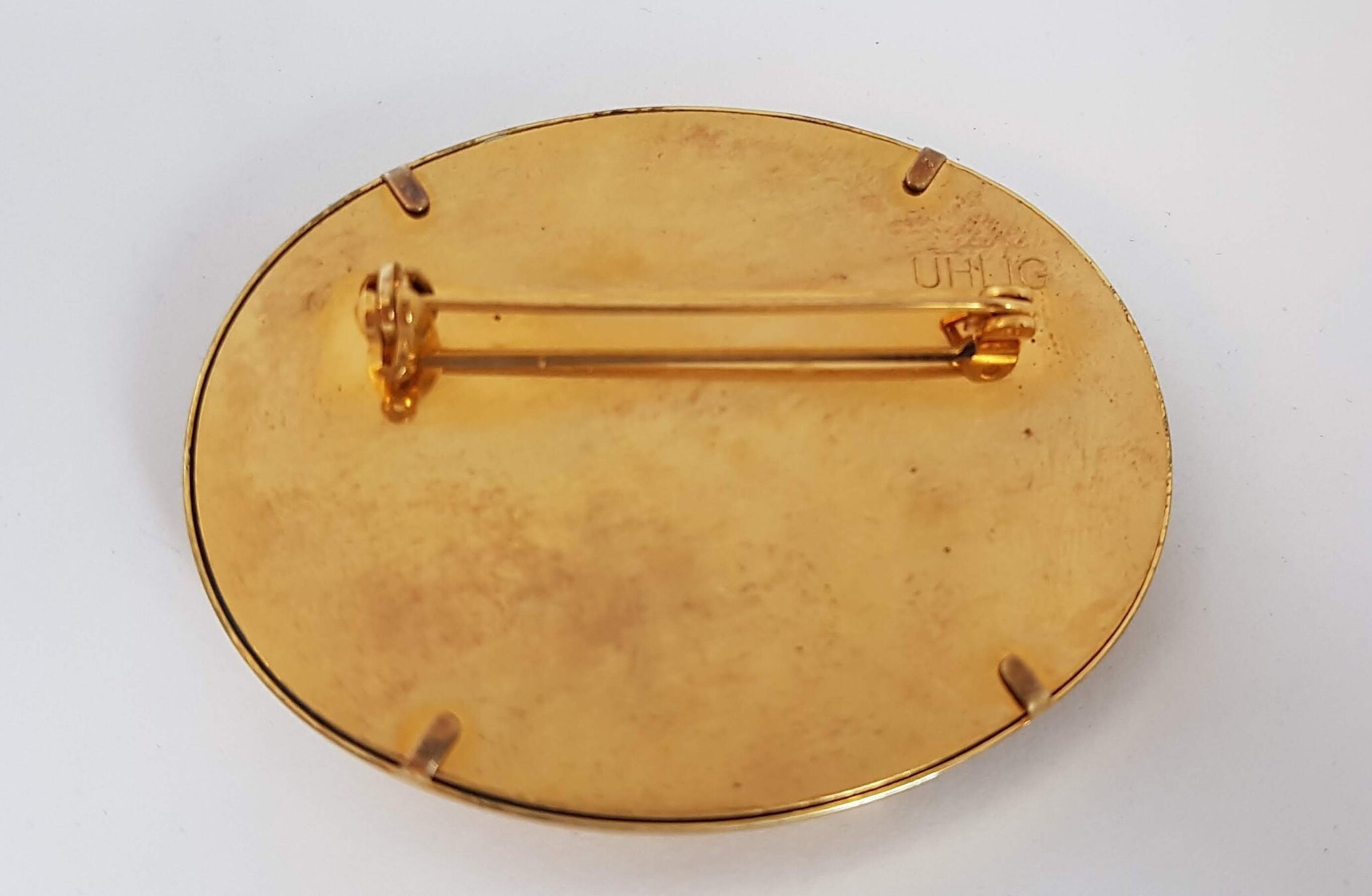 Uhlig brooch discount