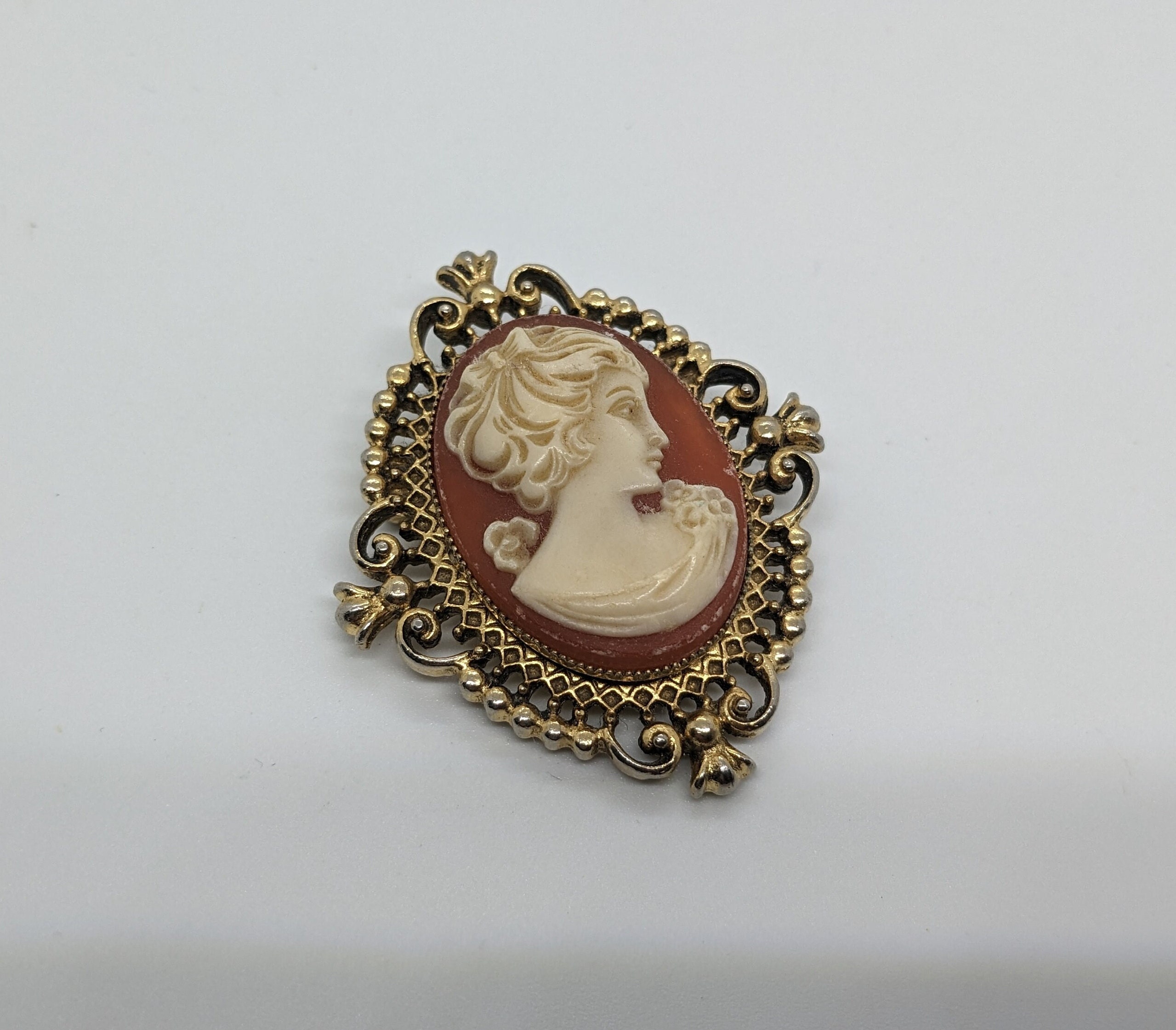 Avon cameo brooch clearance