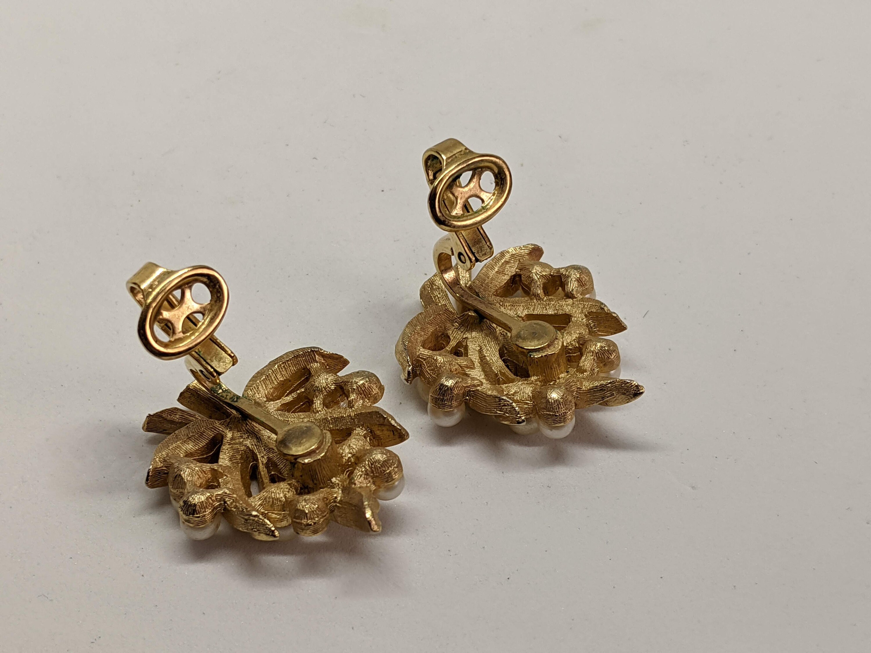 Trifari gold clip on earrings discount