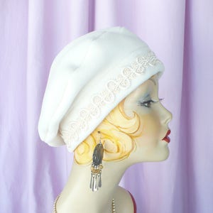 Creamy White Polar Fleece Beret with Double Snail Trim