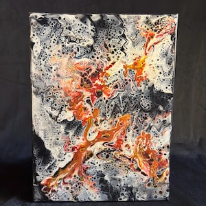 May include: Abstract acrylic painting on canvas. The artwork features a dynamic composition of swirling patterns in black, white, orange, and yellow. The fluid paint creates a textured, organic appearance, with a mix of large and small cells.