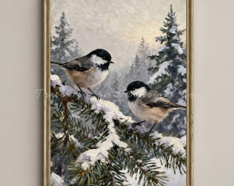 May include: A framed painting of two small birds with black caps and white and tan bodies, perched on a snow-covered evergreen branch. The background shows a snowy forest with a muted colour palette.