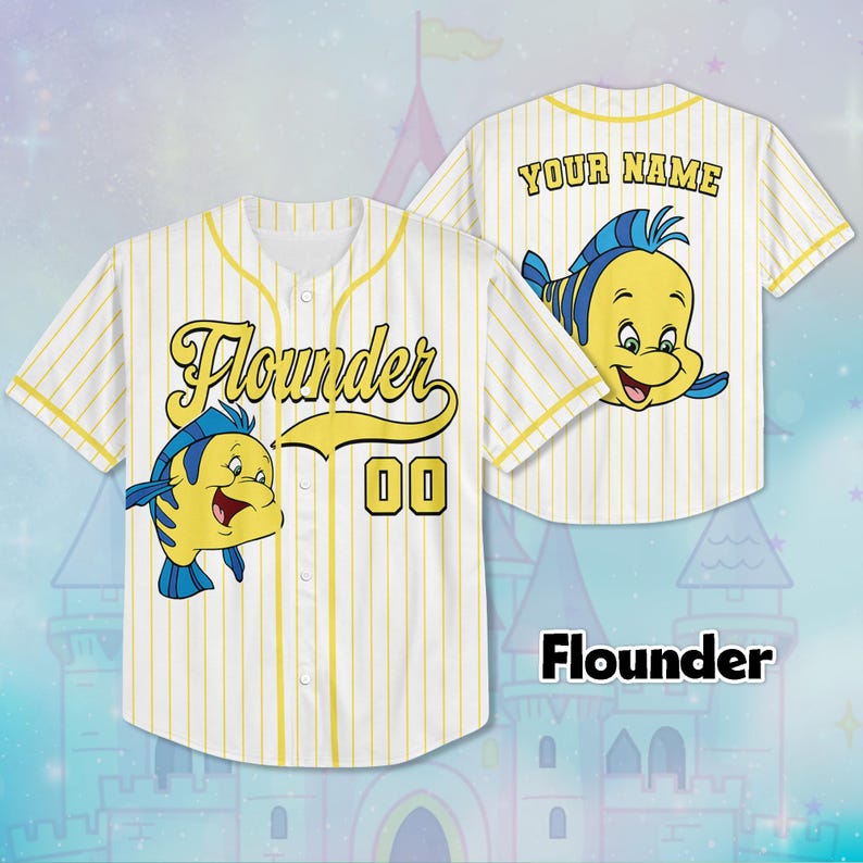 May include: A white and yellow pinstripe baseball jersey with the word "Flounder" in yellow script, a cartoon fish, and the number "00". The back of the jersey has a cartoon fish and the words "YOUR NAME".