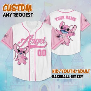May include: White baseball jersey with pink sleeves and accents. Features the word "Angel" and the number "00" in pink, along with a cartoon character. The text "CUSTOM ANY REQUEST" and "KID/YOUTH/ADULT BASEBALL JERSEY" are also visible.