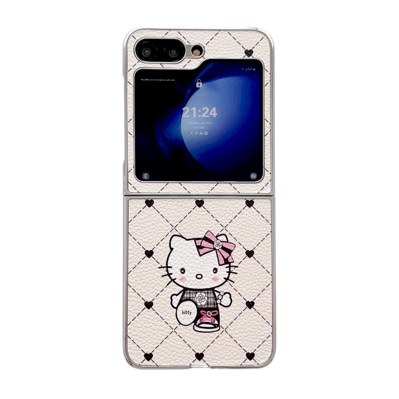May include: A white, foldable phone case featuring a Hello Kitty design. The case has a quilted pattern with black stitching and heart accents. The Hello Kitty graphic includes a pink bow and the word "kitty". The phone screen displays the time.