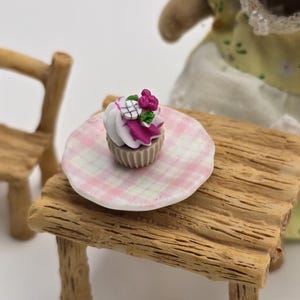 Individually handcrafted miniature raspberry and white chocolate cupcake with detail 1:12