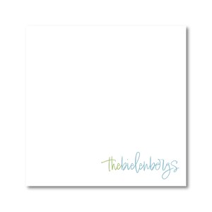 May include: A white square notepad with the text "thebielenborgs" in a script font, colored in a gradient of light green to blue. The notepad is on a white background.