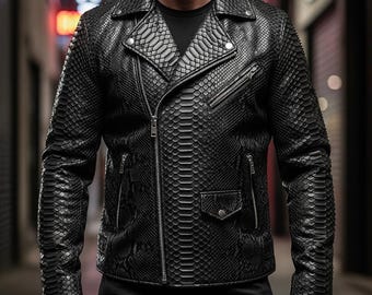 May include: Black leather jacket with a snakeskin texture. The jacket features a classic biker style with an asymmetrical zipper closure, multiple pockets, and a notched collar. The jacket is a dark, textured garment.