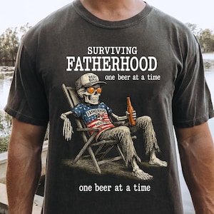 Surviving Fatherhood One Beer at a Time  Skeleton Dad   Funny Backyard Shirt Design Sublimation Father’s Day Printable