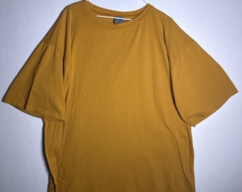 Fast Company Vintage 90-tals Streetwear Boxig T-shirt XL Kamelguld Tillverkad i USA