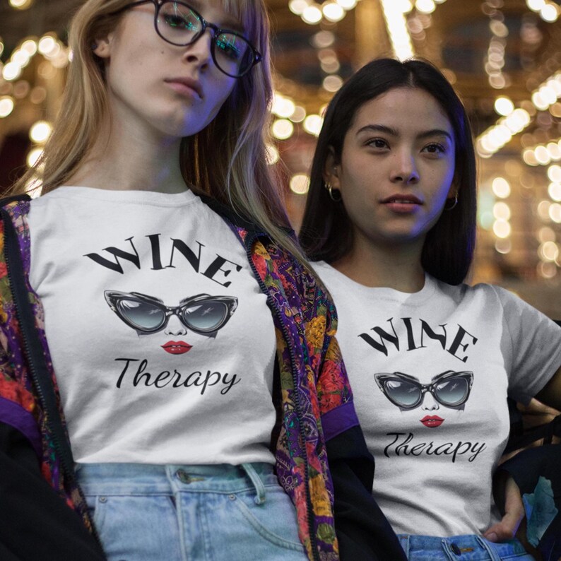 2 friends wearing retro wine therapy tshirt with large cat eye sunglasses