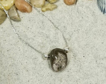 Stone with quartz crystals necklace