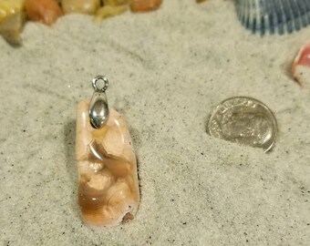 Light pink geode pendant with bail