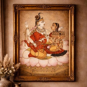 May include: An ornate framed painting depicting Hindu deities. The artwork features a central figure with multiple heads, seated with other figures on a lotus flower. The painting is in warm tones, with gold accents on the frame and figures.