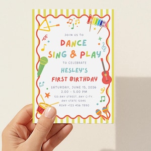 May include: A rectangular birthday invitation card with a yellow and white striped border and a wavy red frame. The text reads JOIN US TO DANCE SING & PLAY TO CELEBRATE HESLEY'S FIRST BIRTHDAY, SATURDAY, JUNE 15, 2026, 2.00 - 5.00 PM, 123 ANY STREET, ANY CITY, ANY STATE 12345, RSVP +123 456 7890. Illustrations include a triangle, xylophone, microphone, guitar, drum, and maracas.