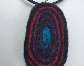 Handfelted graduating red, dark pink, purple & blue merino wool spiral teardrop pendant on a black satin cord necklace