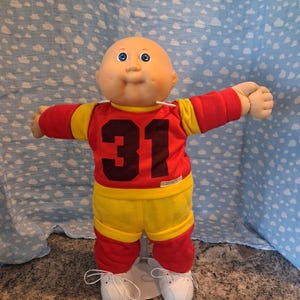 Vintage Cabbage Patch Kid Doll: Bald, Blue Eyes, 31 Sweatsuit