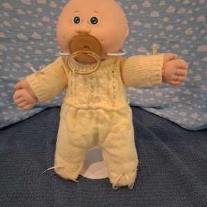 Vintage Cabbage Patch Kid Doll: BBB, Bald, Green Eyes, Paci Face, Yellow knitted outfit