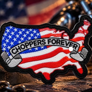 May include: An embroidered patch shaped like the map of the United States, featuring the American flag design in red, white, and blue. A grey banner across the center displays the black text CHOPPERS FOREVER with a small white circular hole.