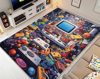 May include: A colorful area rug featuring a vibrant collage of retro video game controllers, consoles, and accessories. The rug's design includes a large screen, game cartridges, and various buttons, creating a playful and nostalgic theme.