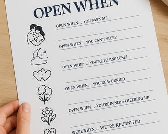 May include: A white paper with the words "OPEN WHEN" in navy blue. Below, there are lines with prompts like "YOU CAN'T SLEEP" and "YOU'RE WORRIED". The paper has simple black line drawings of a couple, a moon, hearts, and flowers.