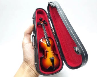 Instrumento de violín en miniatura + estuche rígido