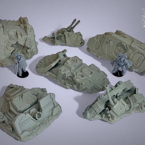 May include: A selection of unpainted miniature war game terrain pieces, including tanks and building ruins. The pieces are in a light grey colour and are designed for tabletop gaming. A miniature figure is included.