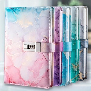 May include: A collection of colorful journals with a marble design. Each journal has a unique color scheme, including pink, purple, blue, and green. A silver combination lock secures the front cover of each journal. The journals are bound with a matching color strap.