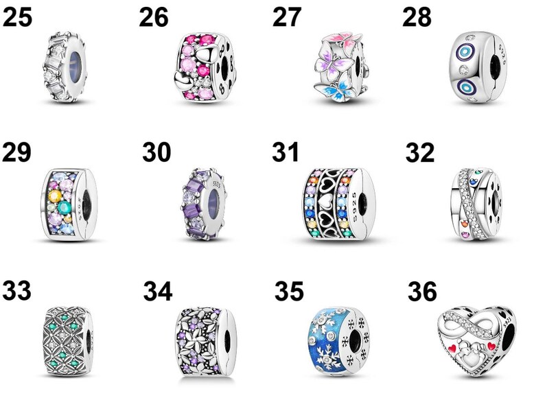 May include: A collection of silver-colored charm beads with various designs. Some beads feature colorful gemstones, while others showcase patterns like hearts, flowers, and snowflakes. One bead has an infinity heart design. These beads are likely for bracelets or necklaces.