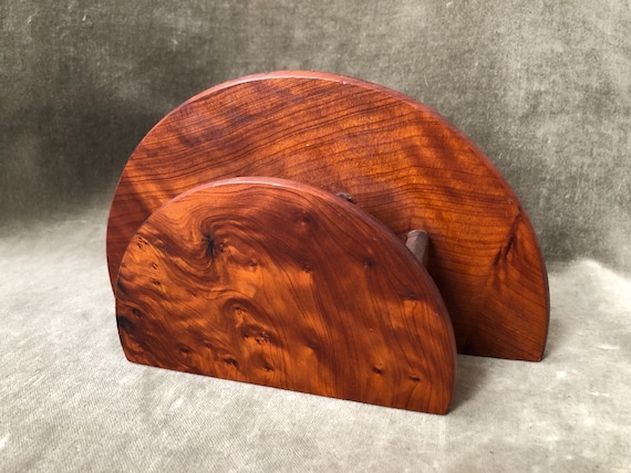 Every burl is a one-of-a-kind natural pattern — this redwood burl organizer is essentially a tiny piece of sculptural wood art sitting on your desk.