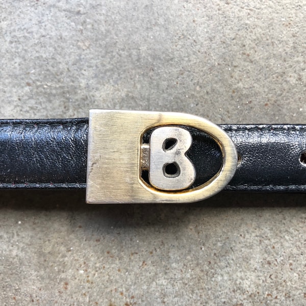 Skinny Slim Black Leather Belt XS S 26 27 28 29 Waist Vintage Gold Silver Logo DB Initial Buckle Retro 1970s 70s 1980s 80s Dooney & Bourke