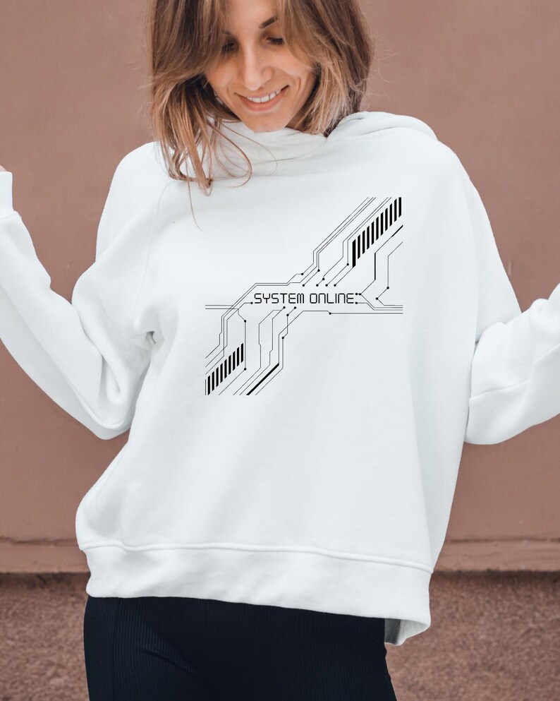 May include: White hoodie with a black graphic design featuring circuit board lines and the text "SYSTEM ONLINE." The hoodie is a casual garment, suitable for everyday wear.