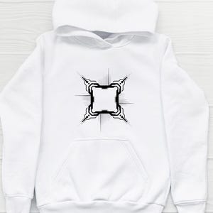 May include: White hoodie with a black geometric design on the front. The design is a square with intricate details and lines radiating outward. The hoodie has a hood and a front pocket.