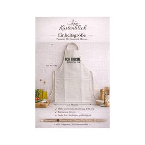 Könnte beinhalten: Ein cremefarbenes Kochschürze mit dem Text "ICH KOCHE - Du machst die Küche" in Schwarz. Die Schürze ist ca. 100 cm hoch und 66 cm breit. Sie besteht aus 65% Polyester und 35% Baumwolle.