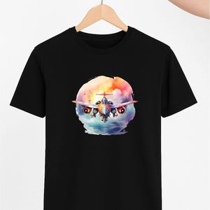 Camiseta colorida de avión de combate: camiseta artística de acuarela para aviadores, amantes de la aviación y entusiastas militares.