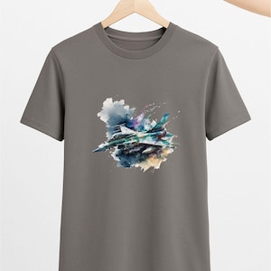 Watercolor Jet Fighter T-Shirt – Artistic Combat Aircraft Tee with Color Splash Design for Pilots, Aviators & Jet Lovers