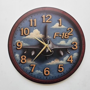 F-16 Fighter Jet Wall Clock – Military Aircraft Decor – Pilot Gift – Aviation Lover Timepiece – Air Force Plane Wall Art for Home or Office