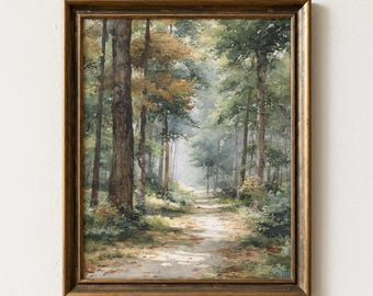 Op de afbeelding: Een rechthoekig wandkunstwerk met een schilderij van een bospad dat door hoge bomen met groen en goudkleurig gebladerte slingert, gevat in een donkergouden metalen lijst met een textuurafwerking en een gedetailleerde binnenrand.