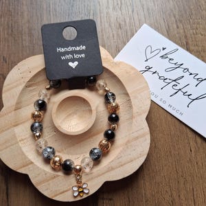 Bee charm beaded bracelet