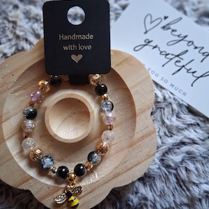 Bee charm beaded bracelet