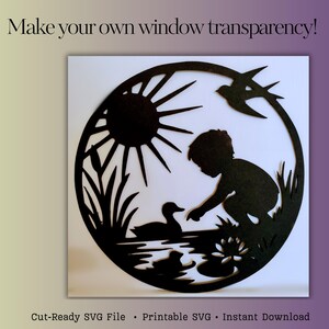 Puede incluir: Silueta negra de un niño que se acerca a patos en un estanque, con un sol y un pájaro en un marco circular. El texto dice "Make your own window transparency!" y "Cut-Ready SVG File • Printable SVG • Instant Download."