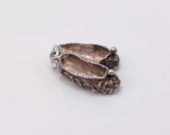 DESIGN - Bague en acier inoxydable avec cristal vert taille baguette - Doré