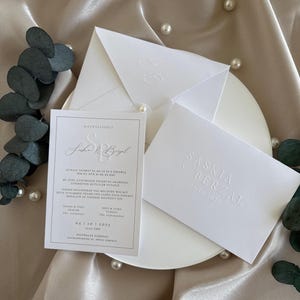 Embossed Wedding Invitation with Pearl Detail – Minimalist White Elegance for Luxury Celebrations