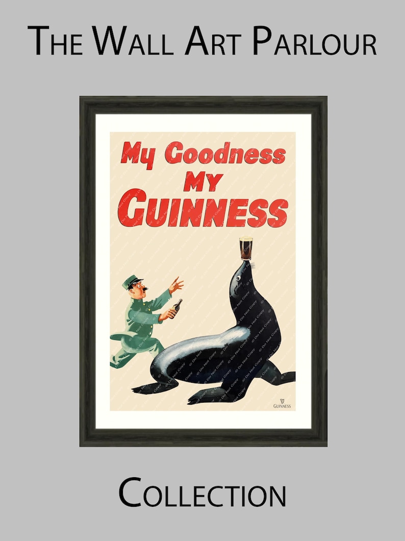 May include: Framed vintage Guinness advertisement print. The artwork features a seal balancing a pint of Guinness on its nose, with a man in a green uniform running towards it. The text "My Goodness My Guinness" is displayed in red.
