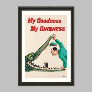 May include: Framed vintage Guinness poster with a cartoon illustration. A man in a green jacket and hat offers a pint of Guinness to a crocodile. The text reads "My Goodness My Guinness". A classic piece of advertising.