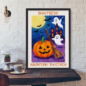 May include: A framed rectangular wall art print featuring a crayon-style illustration of a jack-o'-lantern, a broomstick, two white ghosts, a purple haunted house, and bats against a yellow moon. The text reads BOO CREW and HAUNTING TOGETHER.
