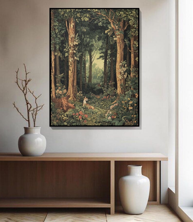 May include: A framed forest scene print. The artwork depicts a lush forest with tall trees, a variety of plants, and a deer resting in the foreground. The color palette is dominated by greens, browns, and touches of red and pink from the flowers.
